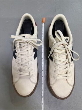 New Balance Men’s Cream Suede Sneakers with Black N and Brown Sole
